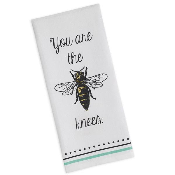 white dish towel with mint and black stripe and dot accent on bottom with you are the bees knees in center of towel. picture of bee in the middle in place of the word bee