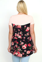 back view of blush and floral print short sleeve tunic top. round neck with a floral print front pocket and back