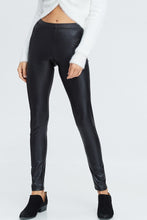 faux leather leggings with an elastic waistband. perfect for any casual outfit or dressed up for a night out on the town