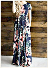 Navy and coral floral print short sleeve long maxi dress with soft and stretchy material, scoopneck, and pockets