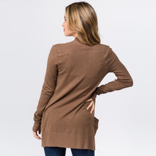 back of mocha brown colored soft and cozy cardigan with pockets. long sleeve and in between knee and butt length