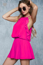 silky feel spaghetti strap fushia pink romper with smocked waist. frills lining side and back with keyhole back