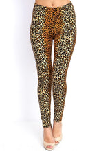 full- length one size- Women's 0-14 and plus size- women's 14-20 mix print leopard leggings are so soft, stretchy, lightweight, and have a 1" inch waistband. smooth fabric, 92% Nylon 8% spandex 