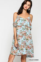 Light Blue with Classic floral look dress, spaghetti straps with a flutter top and cold shoulder with adorable trim. the dress falls a few inches above the knee.  Adjustable straps