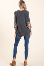 back view of gray grey charcoal sweater wiith bubble sleeves with aztec detail from elbow down. longer perfect with leggings