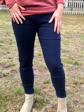 Navy 5 pocket jeggings with an elastic waistband. super stretchy and super comfortable. perfect for a casual everyday look or with a dress shirt and heels. S/M fit- 2-6 M/L fit- 8-10