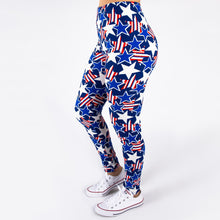 side view of full- length one size- Women's 0-14 and plus size- women's 14-20 mix print american flag and american flag star pring leggings are so soft, stretchy, lightweight, and have a 1" inch waistband. smooth fabric, 92% Nylon 8% spandex 