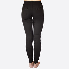 back view of black 5 pocket jeggings with an elastic waistband. super stretchy and super comfortable. perfect for a casual everyday look or with a dress shirt and heels. S/M fit- 2-6 M/L fit- 8-10