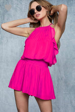 silky feel spaghetti strap fushia pink romper with smocked waist. frills lining side and back with keyhole back