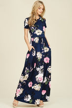 Navy and floral print short sleeve long maxi with soft and stretchy material, scoopneck, and pockets