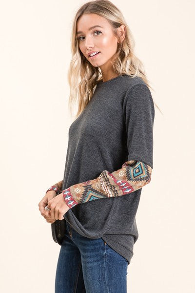 charcoal grey gray long sleeve sweater top with aztec print on sleeves.