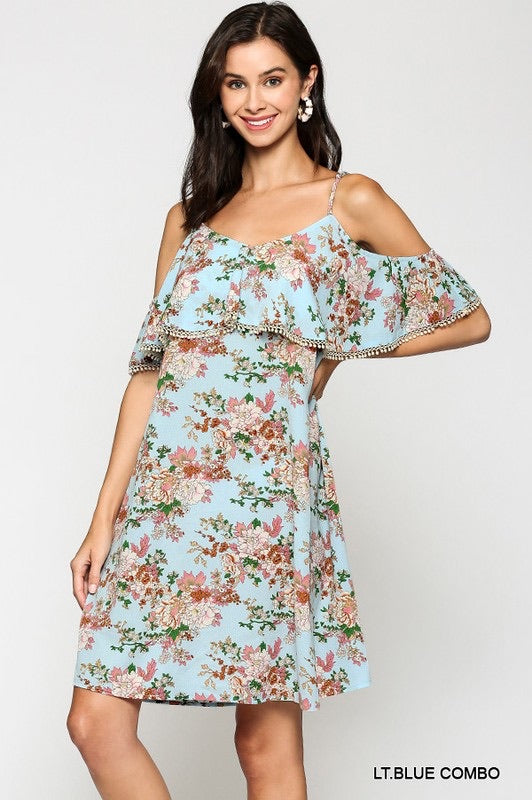 Light Blue with Classic floral look dress, spaghetti straps with a flutter top and cold shoulder with adorable trim. the dress falls a few inches above the knee.  Adjustable straps