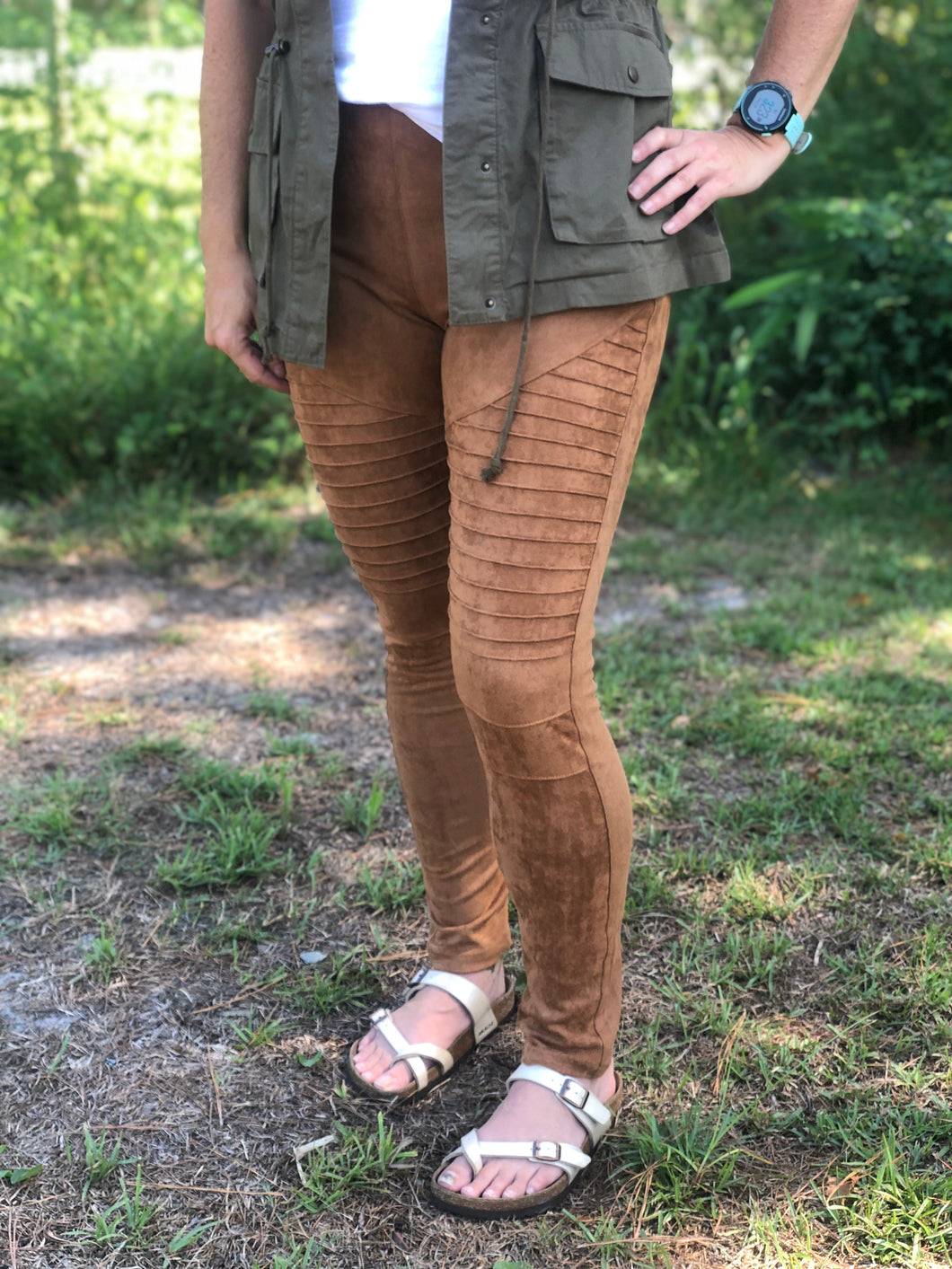 camel faux suede moto jeggings with real back pockets and adorable silver zipper accent on front pocket area. jeggings have an elastic waistband and are so soft and comfortable