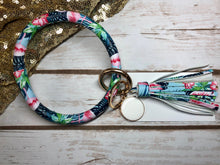 pink, magenta, green, blue tropical flamingo bangle ring keychair with tassle and monogram tag. large ring for any size wrist and easy clip for attaching keys. contains two 2 rings to attach keys to. tropical, flamingo, cute, and fun.