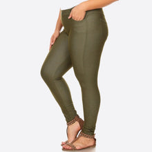 side view of olive 5 pocket jeggings with an elastic waistband. super stretchy and super comfortable. perfect for a casual everyday look or with a dress shirt and heels. S/M fit- 2-6 M/L fit- 8-10