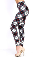side view of full- length one size- Women's 0-14 and plus size- women's 14-20 mix print red and black plaid leggings are so soft, stretchy, lightweight, and have a 1" inch waistband. smooth fabric, 92% Nylon 8% spandex 