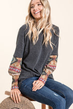 charcoal grey gray long sleeve sweater top with aztec print on sleeves.