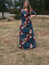 Navy and floral print 3/4 long sleeve long maxi dress with stretchy, soft, and comfortable material with pockets. perfect for any occasion and so many seasons