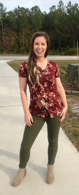 full body picture of olive green moto jeggings with real back pockets and an elastic waistband. can be worn everyday casual or with a dressy top and heels. S/M fit- 2-6. M/L fit- 8-10