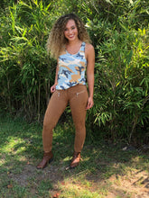 full body view of camel faux suede jeggings with real back pockets and adorable silver zipper accent on front pocket area. jeggings have an elastic waistband and are so soft and comfortable