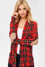 red plaid open face cardigan with long sleeves and faux suede light brown elbow patches. passed the butt in length