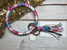 Pink, fuchsia, magenta, and blue tropical bangle ring keychair with tassle and monogram tag. large ring for any size wrist and easy clip for attaching keys. contains two 2 rings to attach keys to. tropical, cute, and fun.