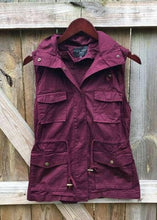 wineberry sleeveless collared cargo vest with 4 front pockets, draw string at waist, and hood