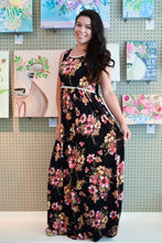 sleeveless black floral maxi with ivory waist and neck. light and flowy dress perfect for the summer