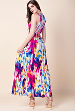back view of mulit color water color tie dye sleevless long maxi dress with cinched waist and pockets